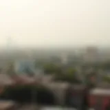 A panoramic view of an urban landscape with visible air pollution