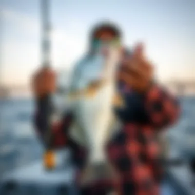 Successful Striped Bass Catch Display Angler showcasing a successful striped bass catch